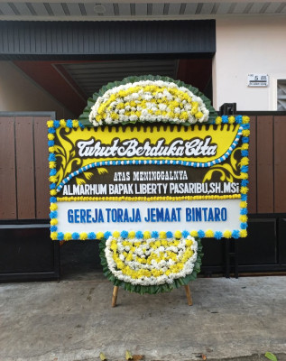 Papan Bunga Duka di Karangpawitan